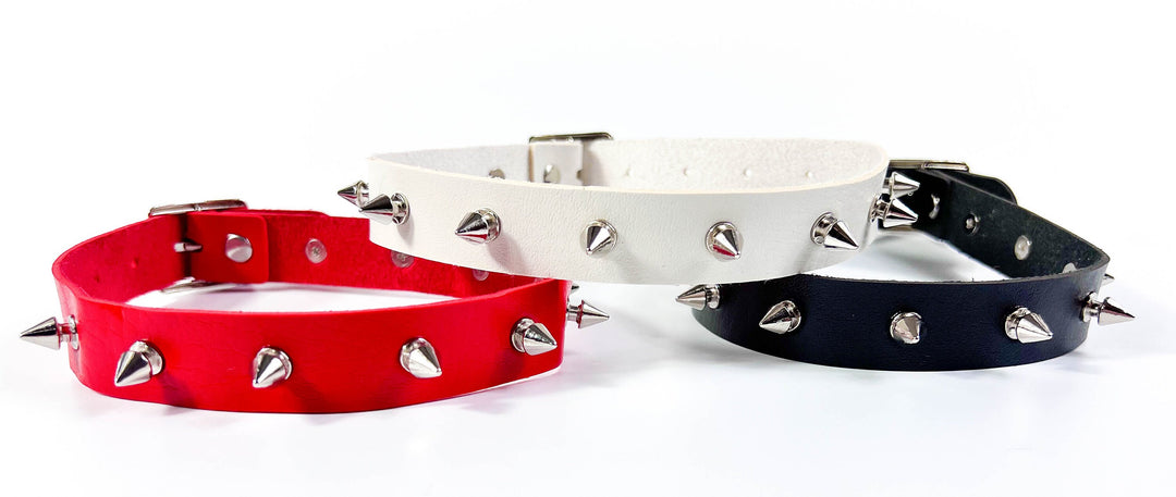 Set of three, red, white and black vegan leather studded collars. 