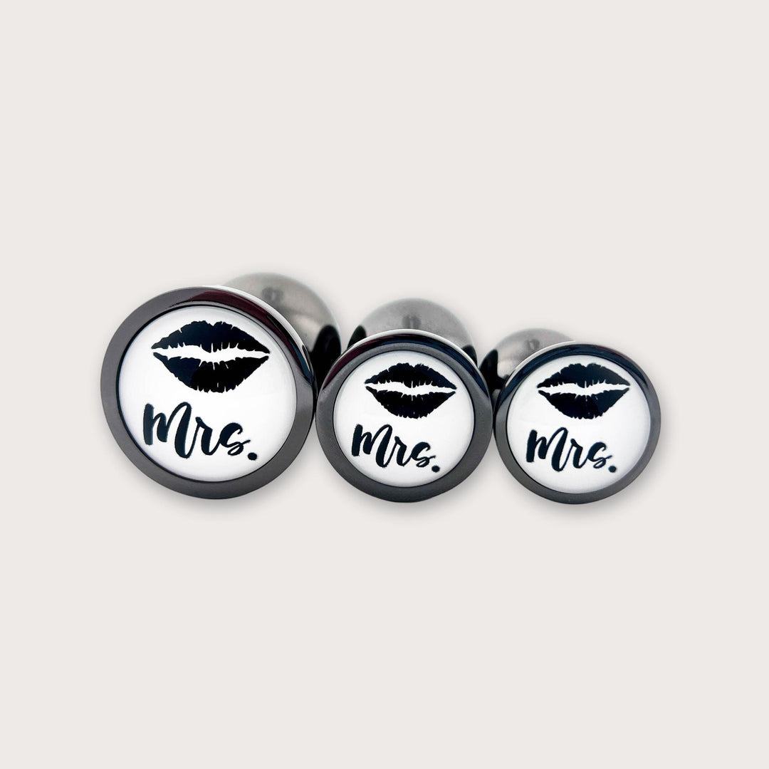 His or Hers Butt Plugs Featuring a Mustache or Sexy Lips Indulge His or Hers Butt Plugs Featuring a Mustache or Sexy Lips Indulge