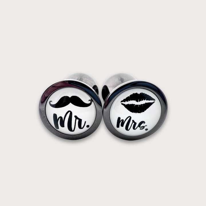 His or Hers Butt Plugs Featuring a Mustache or Sexy Lips