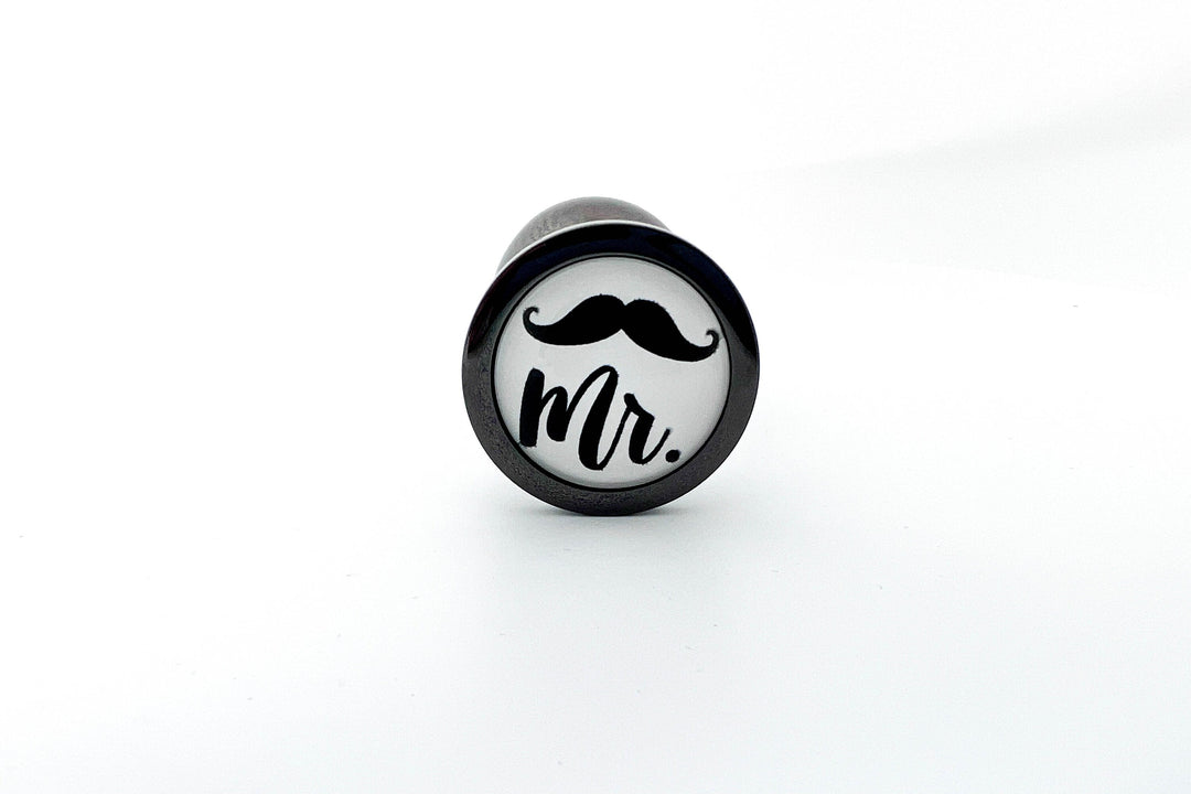 His or Hers Butt Plugs Featuring a Mustache or Sexy Lips Indulge His or Hers Butt Plugs Featuring a Mustache or Sexy Lips Indulge